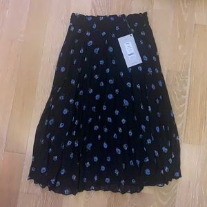 Black skirt with blue floral pattern